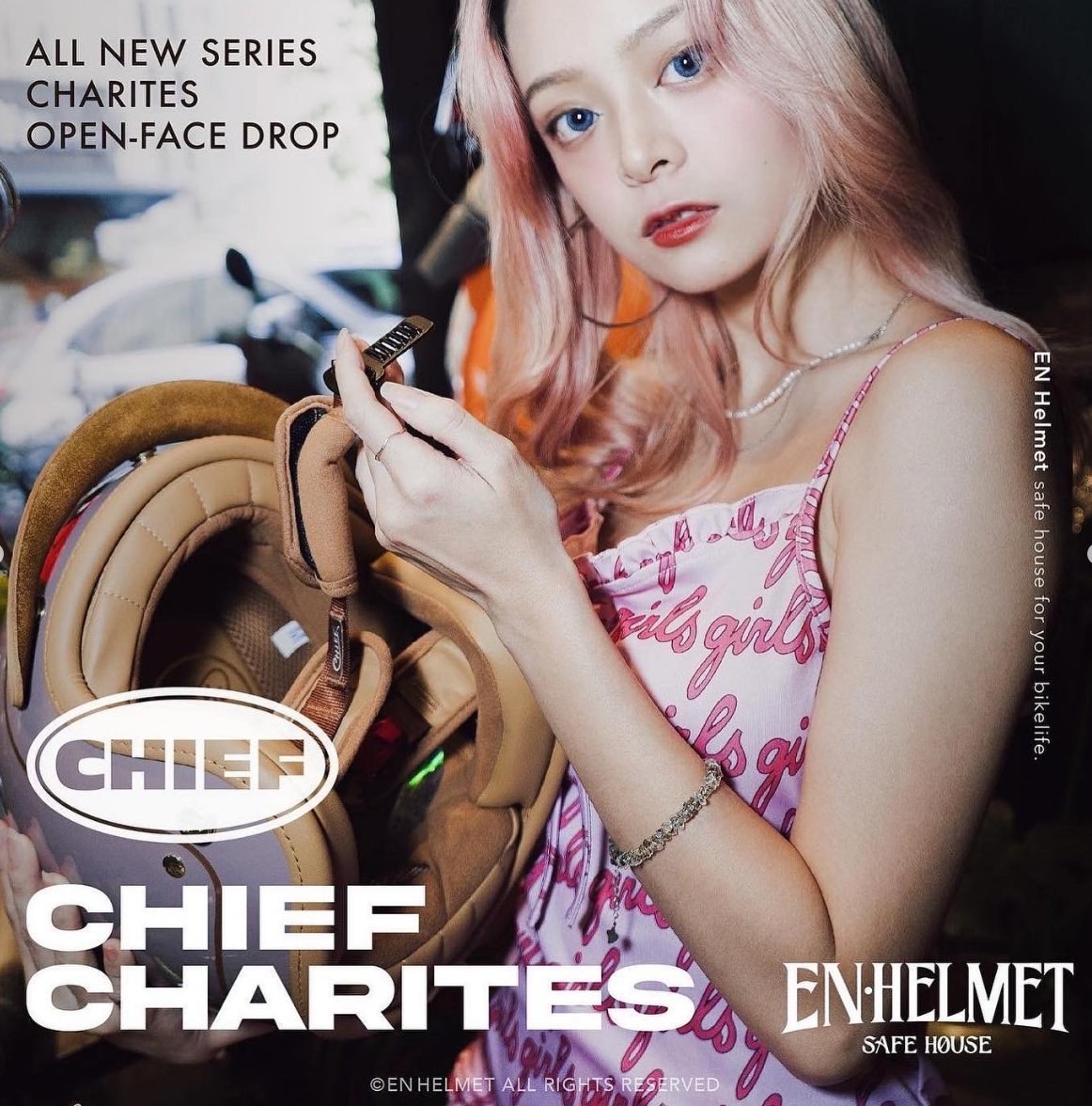 Campaign: close-up of model adjusting the helmet strap buckle, with the client's CHIEF Charites brand graphic overlay